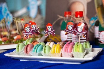 Colorful macaroons at candy bar at children's party