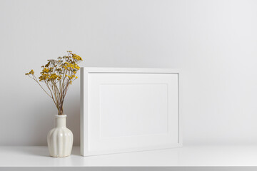 White frame mockup in white minimalistic room with copy space for artwork, photo or print...