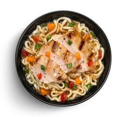 Instant noodles with grilled chicken meat in black bowl isolated