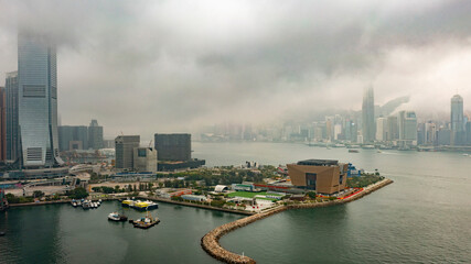 Hong Kong 18 March 2022,Aerial view of West Kowloon Cultural District on a foggy day .