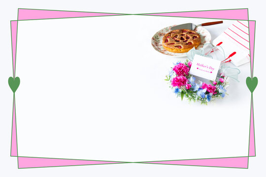 母の日イメージ　自家製イチゴケーキとカーネーションのリース（造花）とショッピングバッグのフレーム