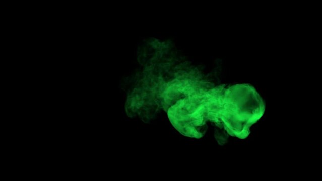 Bottom View of Wispy and Swirly Toxic Green Smoke with Low Density moving Slowly on a Black Background