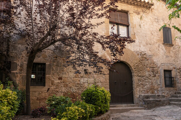 Fototapeta premium stone manor house in the medieval town of pals on the costa brava