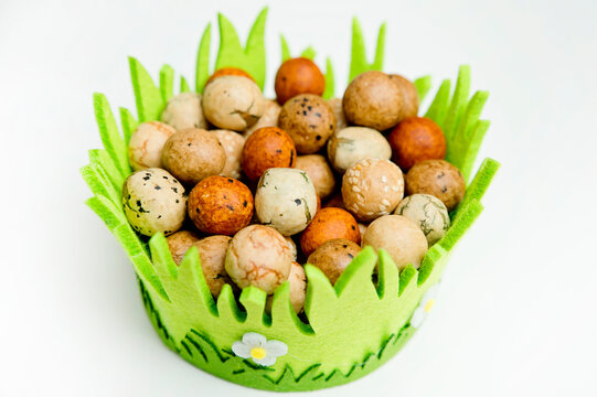 Japanese Rice Nuts "Dragon eggs". Ester desert. Idea for food decoration. Natural color balls with sesame seeds.