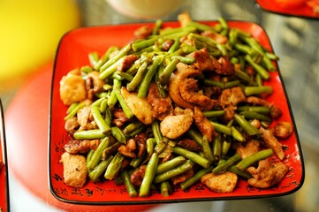 oriental food vietnamese hot salad chicken heart and lots of vegetables bright color serving Chinese and Japanese cuisine. High quality photo