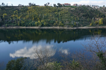 Shadow of the cloud in the river

