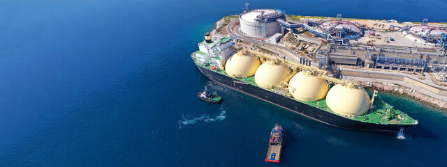 Aerial drone ultra wide panoramic photo with copy space of LNG (Liquified Natural Gas) tanker...