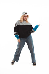 90s inspired. Young caucasian blond-haired hipster woman dancing. Retro. Vertical shot. White background. High quality photo