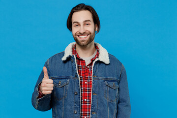 Swanky cheerful young brunet bearded man 20s years old wears warm denim jacket showing thumb up...