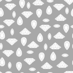 Seamless pattern with white crystals of different shapes. On gray background