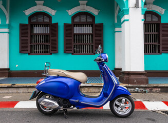 Blue Motor bike at Phuket town thailand. Sino Portuguese building. 