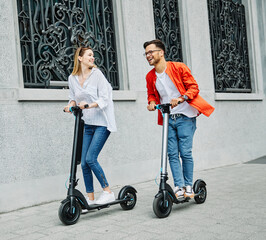 couple young electric scooter city transport riding technology lifestylestreet friend driving modern © Lumos sp