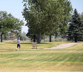 Obraz premium Mature female senior on walking trail outdoors.