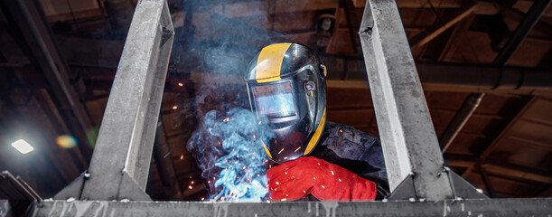 Factory industrial banner, industry worker welder in protective uniform with mask on workplace...