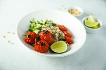 Healthy quinoa bowl with tomato confit