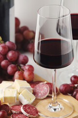 Red wine in a transparent white glass