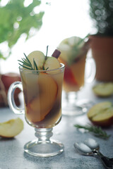 Warm apple autumn drink with cinnamon