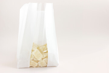 Healthy organic snack: dried (dehydrated)  Aloe Vera chunks in the white craft packaging bag ...
