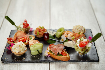 Different tasty bruschettas