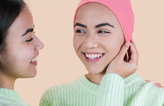 Optimistic Woman After Chemotherapy, Lesbian Couple Fighting Cancer, With Pink Scarf - World Cancer Day Concept -