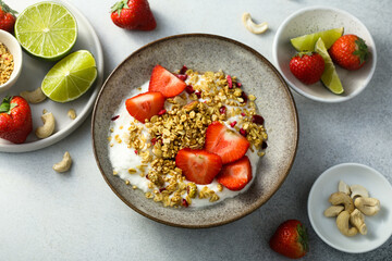 Granola with yogurt and fresh strawberry