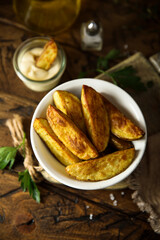 Roasted potato wedges with sauce