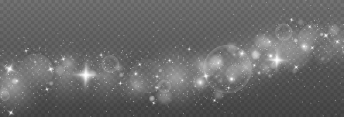 White sparks and glitter special light effect. Shining bokeh is isolated on a transparent background. Christmas light effect.