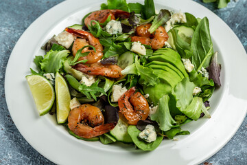 Seafood salad with avocado, blue cheese and smoked shrimps. Homemade vegetarian shrimp salad. banner, menu recipe place for text, top view