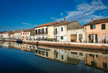 Fototapeta na wymiar Houses on the Porto Canale in Cesenatico Italy