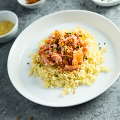 Couscous with hot smoked salmon
