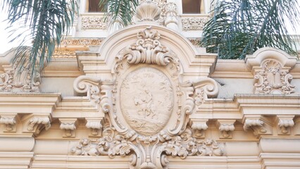 Spanish colonial revival architecture in Balboa Park, San Diego, California USA. Historic building in classic baroque or rococo romance style. Casa or old castle ornamental stucco decor, antique art.