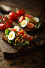 Egg toast with tomato and olive paste