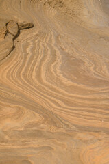 Rock surface showing different strata. Montana Clara. Integral Natural Reserve of Los Islotes. Canary Islands. Spain.