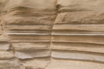 Rock surface showing different strata. Montana Clara. Integral Natural Reserve of Los Islotes....