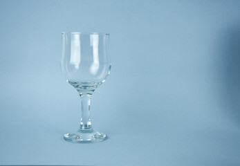 wine glass on a blue background