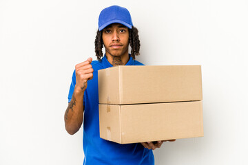 Young African American delivery man isolated on white background showing fist to camera, aggressive facial expression.