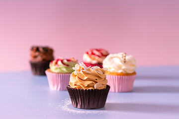 cupcakes. rosy and blue background advertasing food card