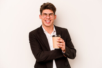 Young caucasian business man holding takeaway coffee isolated on white background laughing and having fun.