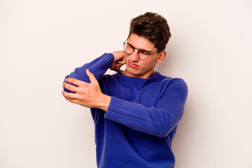 Young caucasian man isolated on white background massaging elbow, suffering after a bad movement.