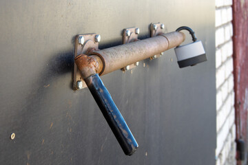 Old wooden door with rustic lock