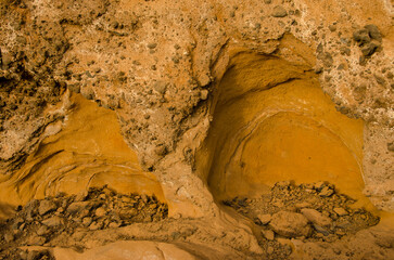 Rocky cliff in Caleton Oscuro. Montana Clara. Integral Natural Reserve of Los Islotes. Canary Islands. Spain.