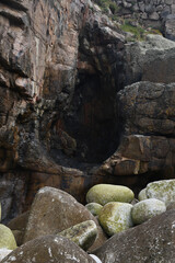 Fototapeta na wymiar Cave entrance Porth Nanven the Cornish Coast