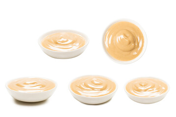 Mushroom sauce in a bowl isolated on white background.