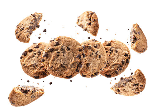 Collection of broken chocolate chip cookies. cookies broken in pieces with crumbs on white background.