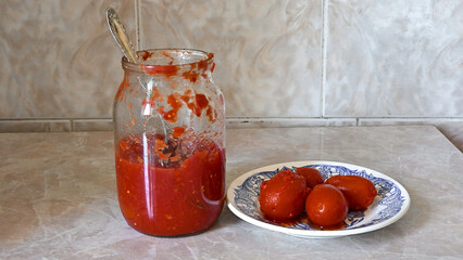 home preservation, canned tomatoes, a can of preservation on the table