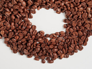 Coffee beans isolated on white background with copyspace for text. Coffee background or texture concept.