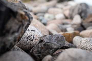 Rocks and stones on the beach in Normandy, France.