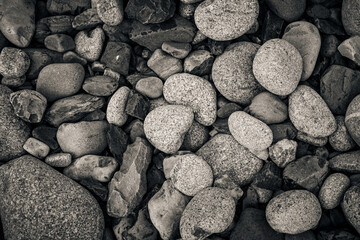 Rocks and stones on the beach in Normandy, France.