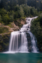 Close-up of the Piumogna waterfall in Faido, Ticino, Switzerland, photographed with a long exposure.