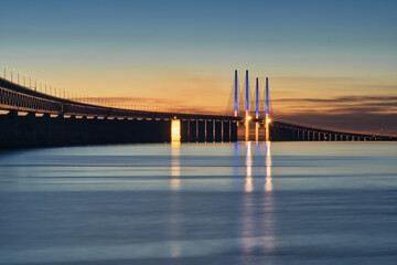 The Oresund Bridge between Denmark and Sweden at sunset